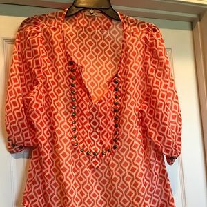 Cute, light weight, sheer feel, white tank under